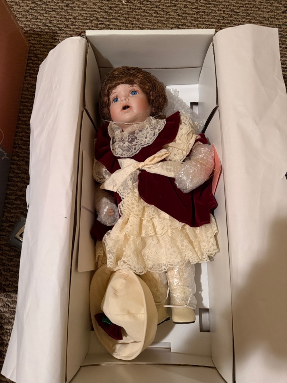 Antique-Style Porcelain Doll in Cream Lace and Burgundy Velvet Outfit.